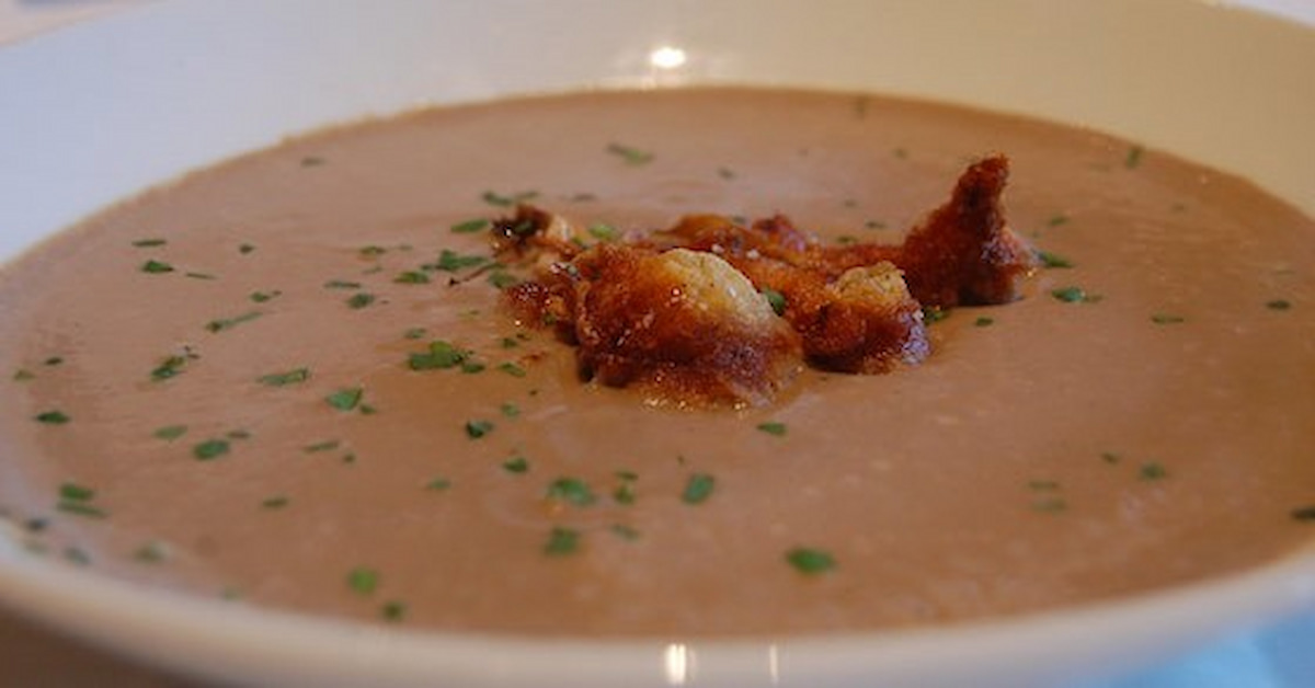 A comforting picture of Cream of Mushroom Soup with Chicken and Chives